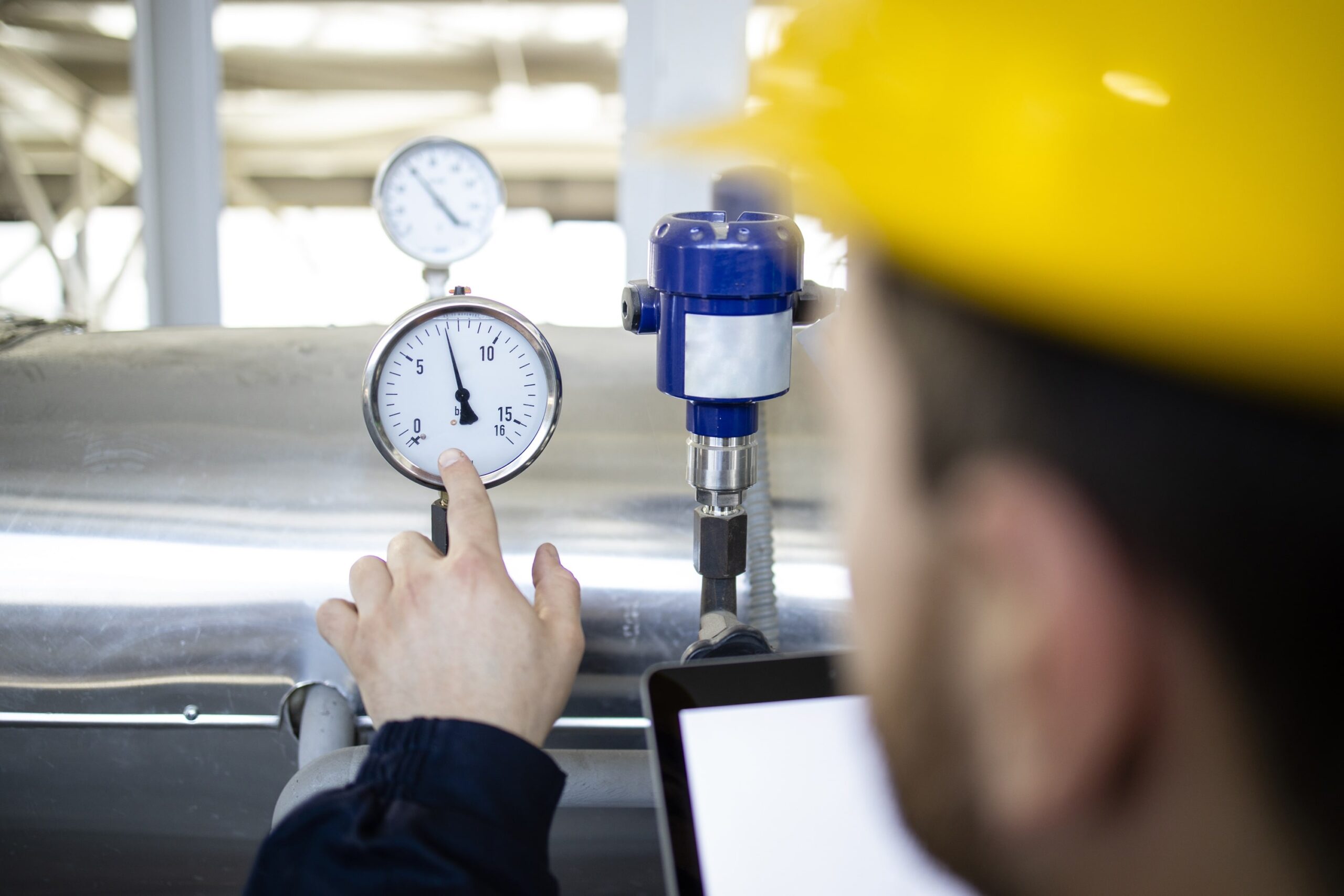 heating-plant-worker-reading-water-pipe-pressure-energy-factory